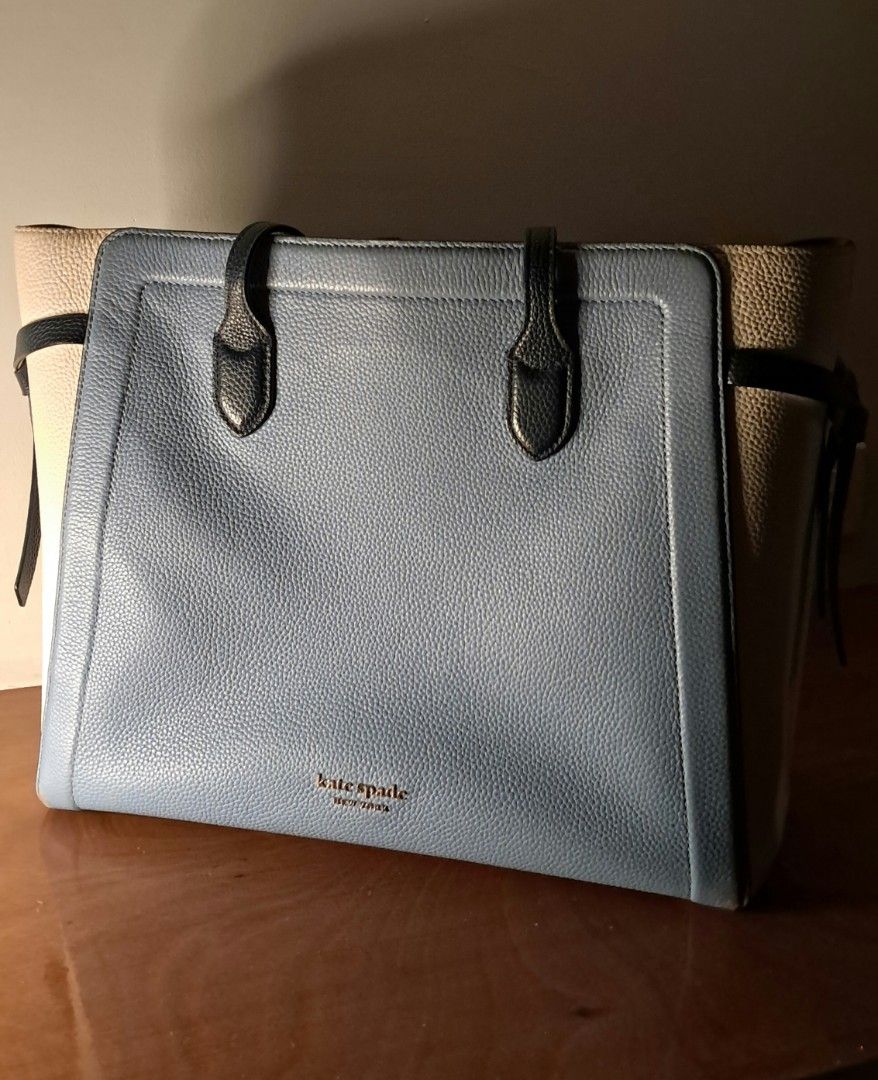 Kate Spade Knott Colorblocked Tote Bag (Category: Tote Bags) located in Manila. Submitted by cobydog (Listing ID 1409390553, Image 3). Description: DIMENSIONS 11.75"h x 14.5"w x 6"d Strap Drop: 11.5" FEATURES Hardware: Gold Tone Exterior material: Pebbled leather w/ smooth Italian trim Interior material: Fabric Style: Knott Colorblocked w/ leather strap & interior snap-tab slip pocket.
