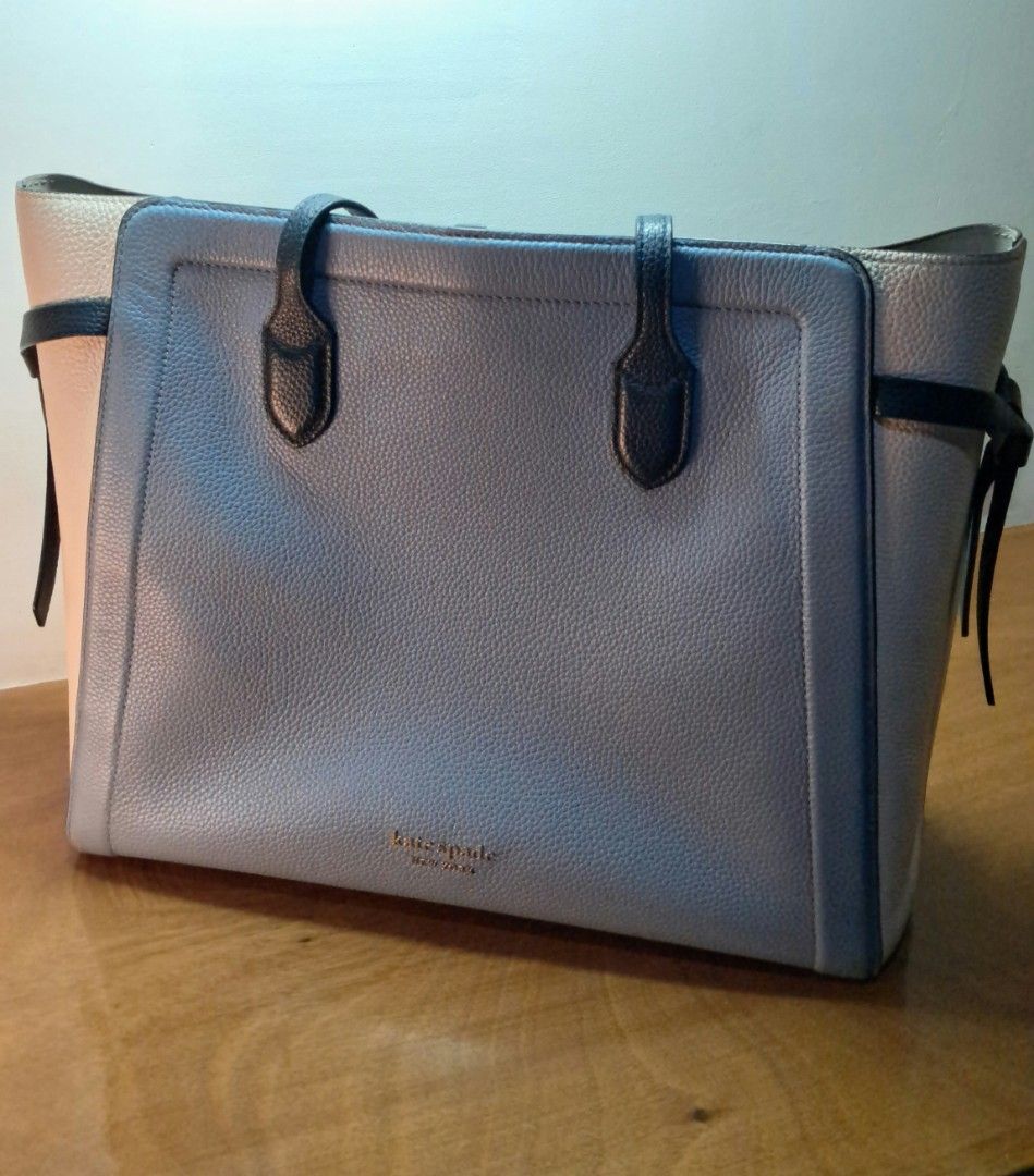 Kate Spade Knott Colorblocked Tote Bag (Category: Tote Bags) located in Manila. Submitted by cobydog (Listing ID 1409390553, Image 1). Description: DIMENSIONS 11.75"h x 14.5"w x 6"d Strap Drop: 11.5" FEATURES Hardware: Gold Tone Exterior material: Pebbled leather w/ smooth Italian trim Interior material: Fabric Style: Knott Colorblocked w/ leather strap & interior snap-tab slip pocket.