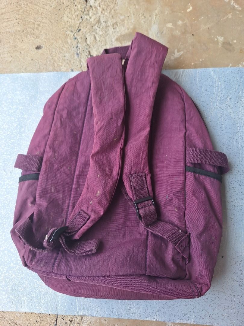 KIPLING Purple Small Backpack (Category: Backpacks) located in Malaybalay. Submitted by mags_sofia (Listing ID 1409379708, Image 2). Description: Dimensions: L: 14", W: 5:, H: 14.5" Material: - polyester exterior and interior - clothed and stitched sling and handles - silver brass hardware Compartment: - main zipped compartment has 1 small zipped pocket and 1 extra slot - 2 middle compartments w/ zipper - 1 Velcro compartment w/ zipper Signs of W