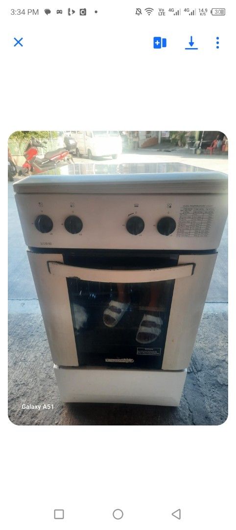 La Germania 4-Burner Gas Stove (Category: Cookers) located in Quezon City. Submitted by jojosally (Listing ID 1409327073, Image 2). Description: La Germania gas stove with four burners and an oven. Features control knobs and a glass oven door. Perfect for cooking your favorite meals. A practical addition to any kitchen..