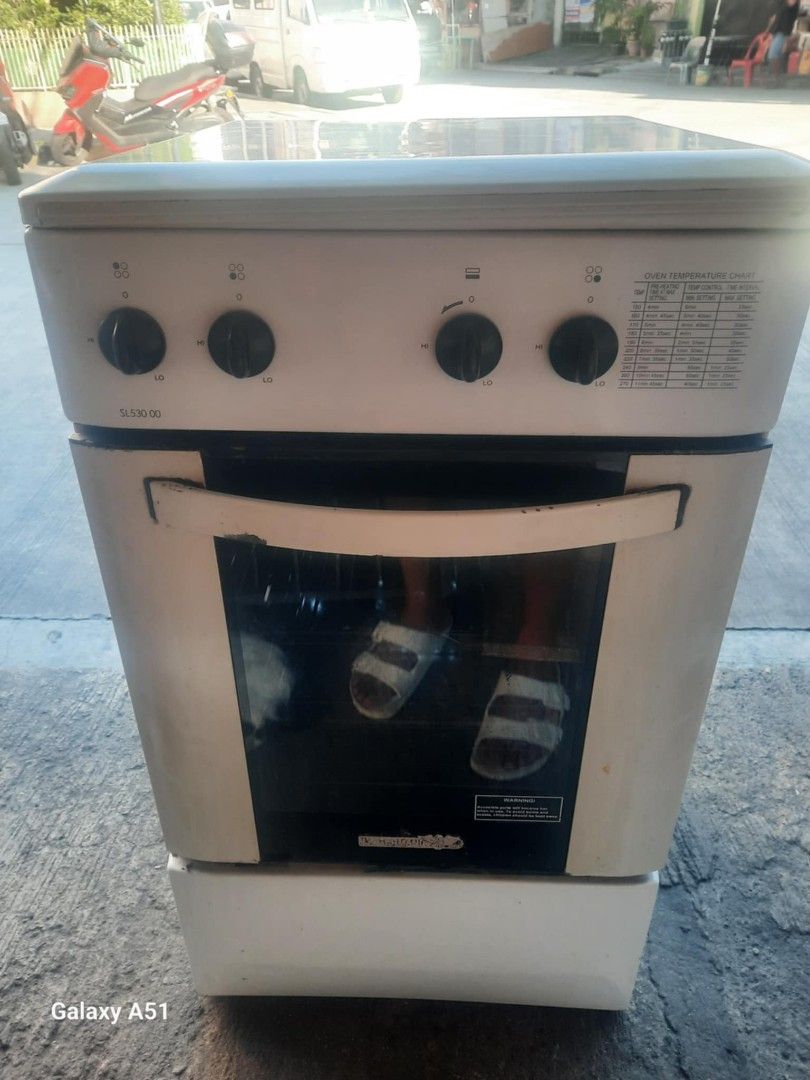 La Germania 4-Burner Gas Stove (Category: Cookers) located in Quezon City. Submitted by jojosally (Listing ID 1409327073, Image 1). Description: La Germania gas stove with four burners and an oven. Features control knobs and a glass oven door. Perfect for cooking your favorite meals. A practical addition to any kitchen..