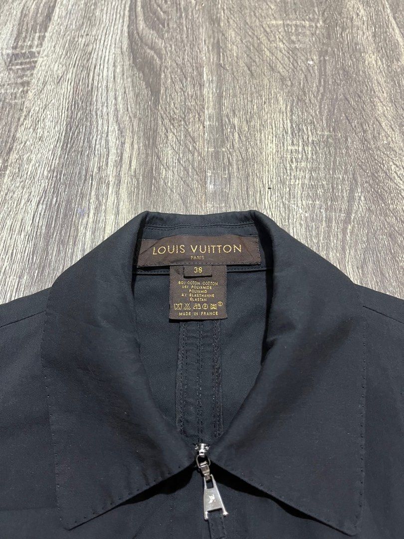 Louis Vuitton Double Zip Vest (Category: Sleeveless) located in Calumpit. Submitted by Essentiality (Listing ID 1409358160, Image 2). Description: Louis Vuitton Double Zip Vest Size 38 W - 16.5 L - 22 Authentic Excellent Condition Missing one button 3k.