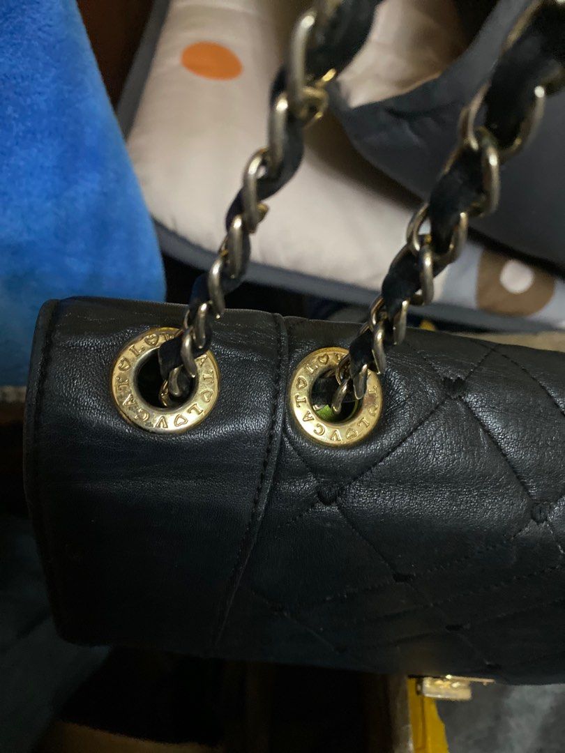 LOVCAT Paris Black Quilted Shoulder Bag (Category: Luxury Bags & Wallets) located in Cavite. Submitted by rmquin05 (Listing ID 1409394854, Image 3). Description: - LOVCAT Paris shoulder bag - Black quilted design - Gold-tone clasp with embellishments - Chain straps - Black lining - Interior zippered pocket - LOVCAT label - Gold-tone hardware - Flap closure.