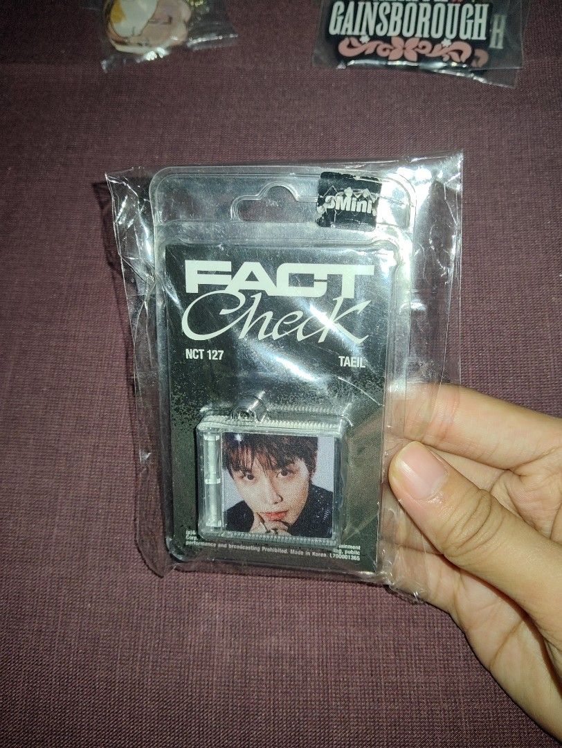 NCT 127 Fact Check SMini album Keychain (Category: K-Wave Merchandise) located in Pasig City. Submitted by hazelscollectibles (Listing ID 1409341968, Image 1). Description: auth see pic for inclusions.
