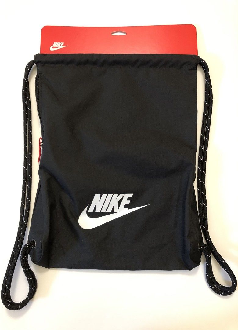 Nike Drawstring Bag Extra Pocket Black (Category: Backpacks) located in Cainta. Submitted by nkkn.ca.us (Listing ID 1409279445, Image 1). Description: - Brand new Nike drawstring bag - Classic black color - Extra pocket with zipper - Features white Nike logo - Durable black and white rope drawstrings - Comes with original tag.