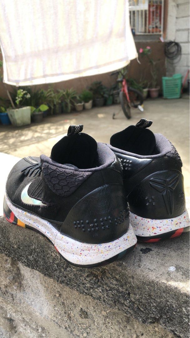 Nike Kobe Mid Ad “NCAA” (Category: Sneakers) located in Manila. Submitted by warmfalcon-b70c (Listing ID 1409319111, Image 3). Description: - Black Nike Kobe Mamba Focus basketball shoes - Black upper - White speckled midsole - Colorful outsole - Nike swoosh visible - High-top design with black laces - Kobe logo on heel - Soles show some wear - Shoes only no box.
