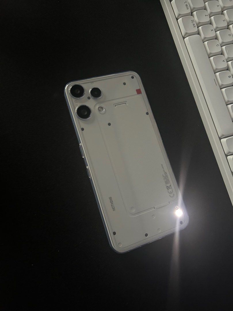 Nothing Phone (3a) Lite (Category: Android Others) located in Quezon City. Submitted by bythefire (Listing ID 1409267900, Image 1). Description: selling my Nothing Phone (3a) Lite in White 8GB / 128GB got the phone less than a month ago - pristine, brand new condition - bought November 2025 from digital walker - no internal and external defects - has had its included case on since day 1, zero scuffs and scratches - supports dual sim or one sim + 