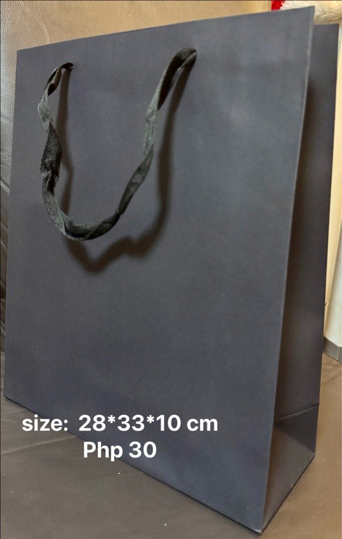 Paper Wine / gift Bag (Category: Occasions & Party Supplies) located in Quezon City. Submitted by kryshnanzyanna (Listing ID 1409281312, Image 3). Description: - Stylish paper wine and gift bags - Available in multiple colors - Different sizes available - Perfect for gifts - Made of quality paper - DM for inquiries.