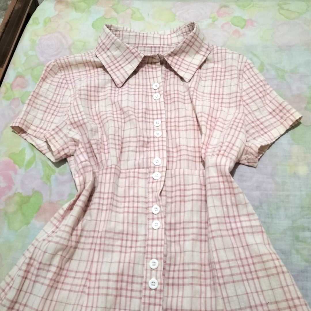 Pink Plaid Button-Down Blouse (Category: Dresses) located in San Fernando. Submitted by decluttrwithella (Listing ID 1409329786, Image 2). Description: Originally bought it for 500+ Size: Small Color: Pink (colors shown in photos may vary slightly due to lighting and different screens) Condition: Super cute, worn once, no flaws!👌 PLS READ👇 - Payments thru Gcash - Shipping thru J&T - No when worn photos unless uploaded - Serious buyers only! No 