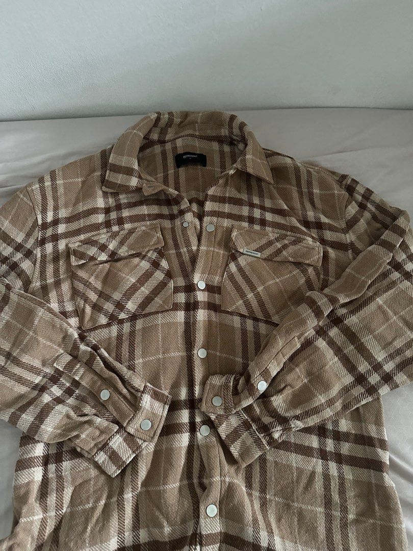 Represent flannel (Category: Tshirts & Polo Shirts) located in Singapore. Submitted by highlux888 (Listing ID 1409355213, Image 1). Description: - Represent flannel - Neutral colour palette - Size: XL - Button-up front - Two chest pockets - Represent logo (front and back) - Great for layering - NEVER WORN .