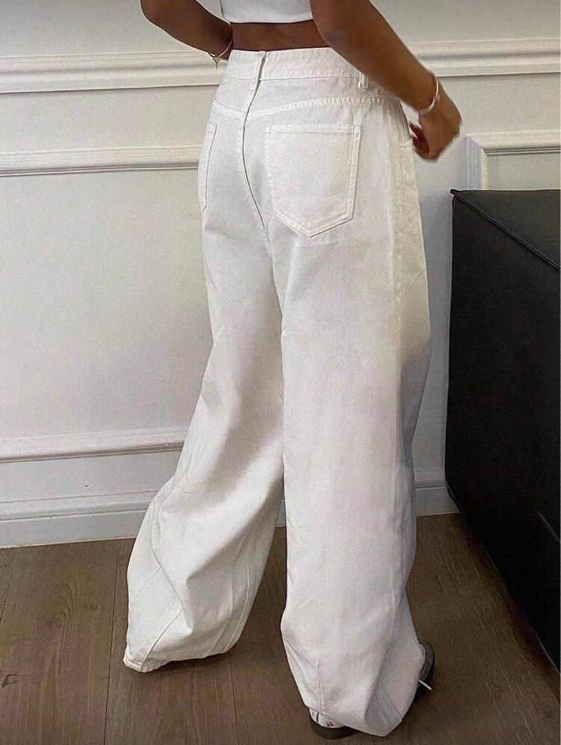 SHEIN Livesso White Denim Pants (Category: Jeans) located in Pasig City. Submitted by luckyvicky_ (Listing ID 1409418768, Image 2). Description: - White wide-leg jeans - High-waisted - Relaxed fit - Perfect for casual, chic outfits - Used only once.