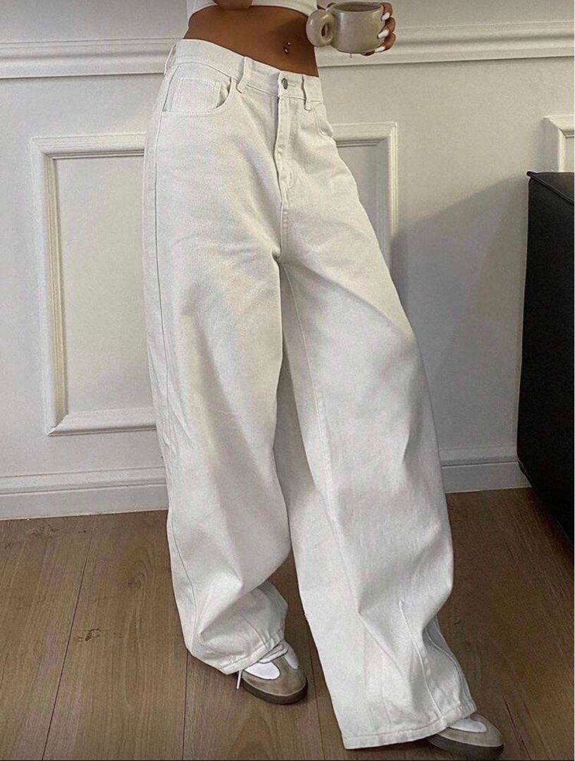 SHEIN Livesso White Denim Pants (Category: Jeans) located in Pasig City. Submitted by luckyvicky_ (Listing ID 1409418768, Image 1). Description: - White wide-leg jeans - High-waisted - Relaxed fit - Perfect for casual, chic outfits - Used only once.