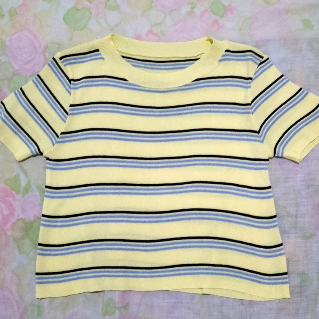 Striped Yellow Knit T-shirt (Category: Shirts) located in San Fernando. Submitted by decluttrwithella (Listing ID 1409329003, Image 2). Description: Size: S-M, measurements are shown in the photos (please allow 1-2 cm difference)📸 Color: Yellow with blue and black stripes (colors shown in photos may vary slightly due to lighting and different screens) Condition: No flaws!👌 PLS READ👇 - Payments thru Gcash - Shipping thru J&T - No when worn phot