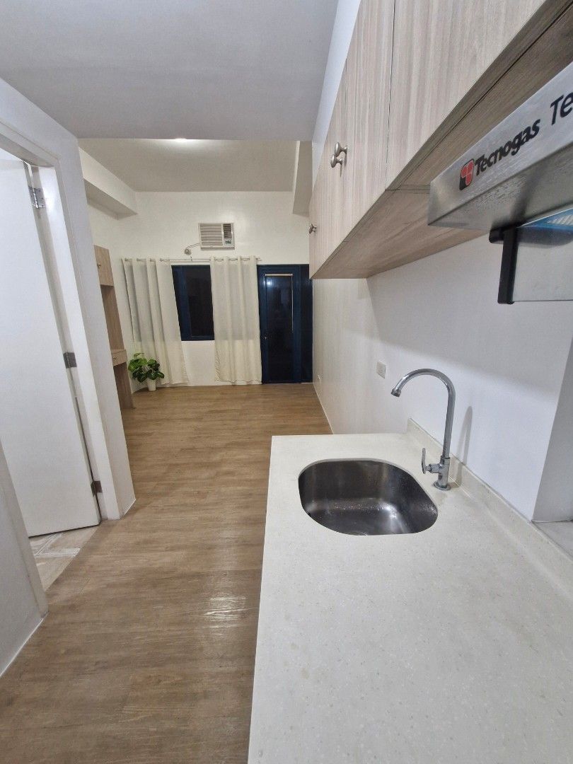 Studio Unit with Private Garden and Parking (Category: Apartments & Condos) located in Manila. Submitted by rmwales01175452 (Listing ID 1409396645, Image 1). Description: Studio A Katipunan – Rare Unit w/ Garden + Parking 📍 7th Floor | In front of Elevator & Amenities 🏡 21 sqm + 10.5 sqm Private Garden ❄️ With Aircon Installed 🚗 Tandem Parking (6th Floor, also in front of elevator!) 💰 Price: ₱5.4M all-in A premium, investor-friendly unit in o