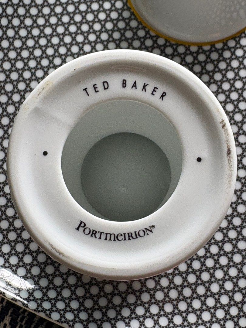 Ted Baker Portmeirion Egg Cups (Category: Coffee & Tea Tableware) located in Taguig. Submitted by gurgeh50 (Listing ID 1409323554, Image 2). Description: - Set of two Ted Baker egg cups by Portmeirion. - Features a stylish black and white patterned design. - Elegant gold rim detail. - Includes a matching tray with a black and white dot pattern. - Ted Baker brand name is visible on the egg cups..