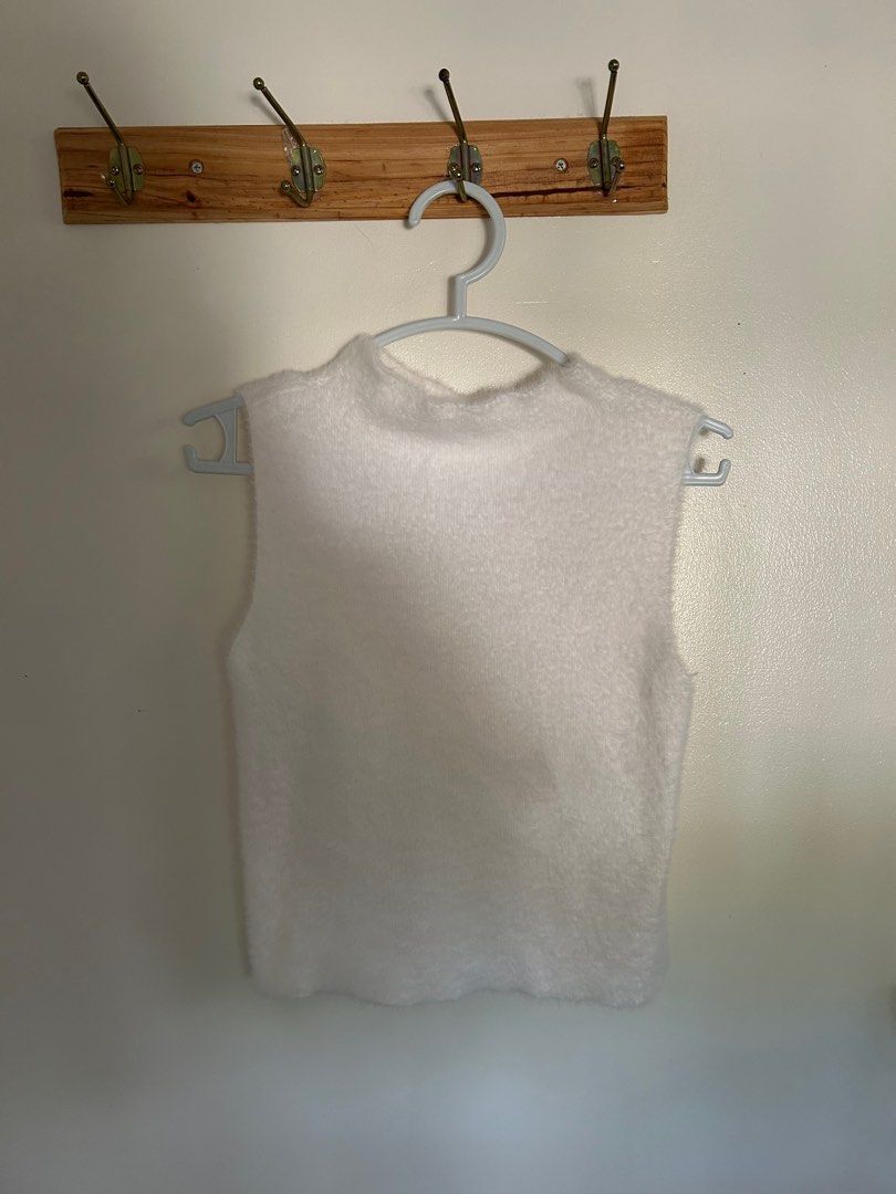 White Furry Sleeveless Top (Category: Sleeveless) located in Manila. Submitted by somepiecesofsun (Listing ID 1409411515, Image 1). Description: .