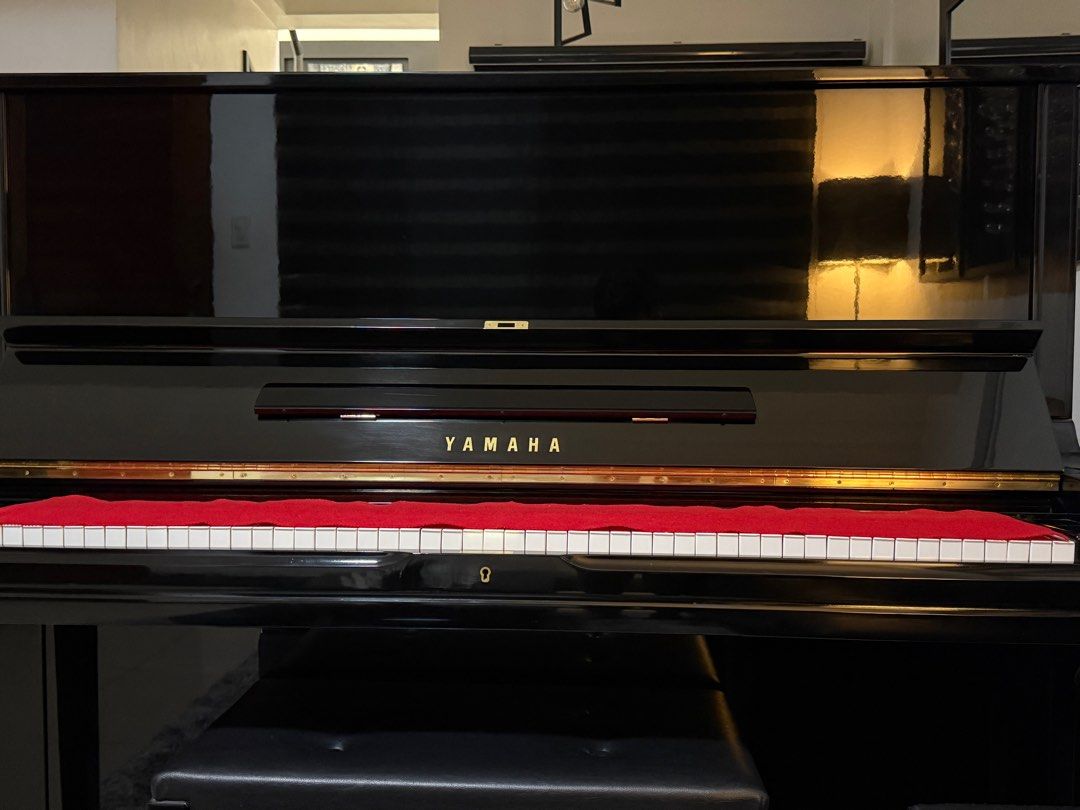 Yamaha Upright Piano U3H (Category: Musical Instruments) located in Quezon City. Submitted by mark062587 (Listing ID 1409267369, Image 1). Description: - Yamaha upright piano - Glossy black finish - Red felt strip - Includes matching black bench - Full keyboard - Well-maintained - Ready for immediate use.
