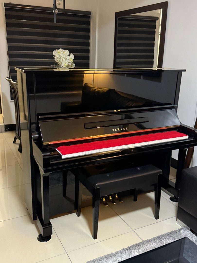 Yamaha Upright Piano U3H (Category: Musical Instruments) located in Quezon City. Submitted by mark062587 (Listing ID 1409267369, Image 2). Description: - Yamaha upright piano - Glossy black finish - Red felt strip - Includes matching black bench - Full keyboard - Well-maintained - Ready for immediate use.