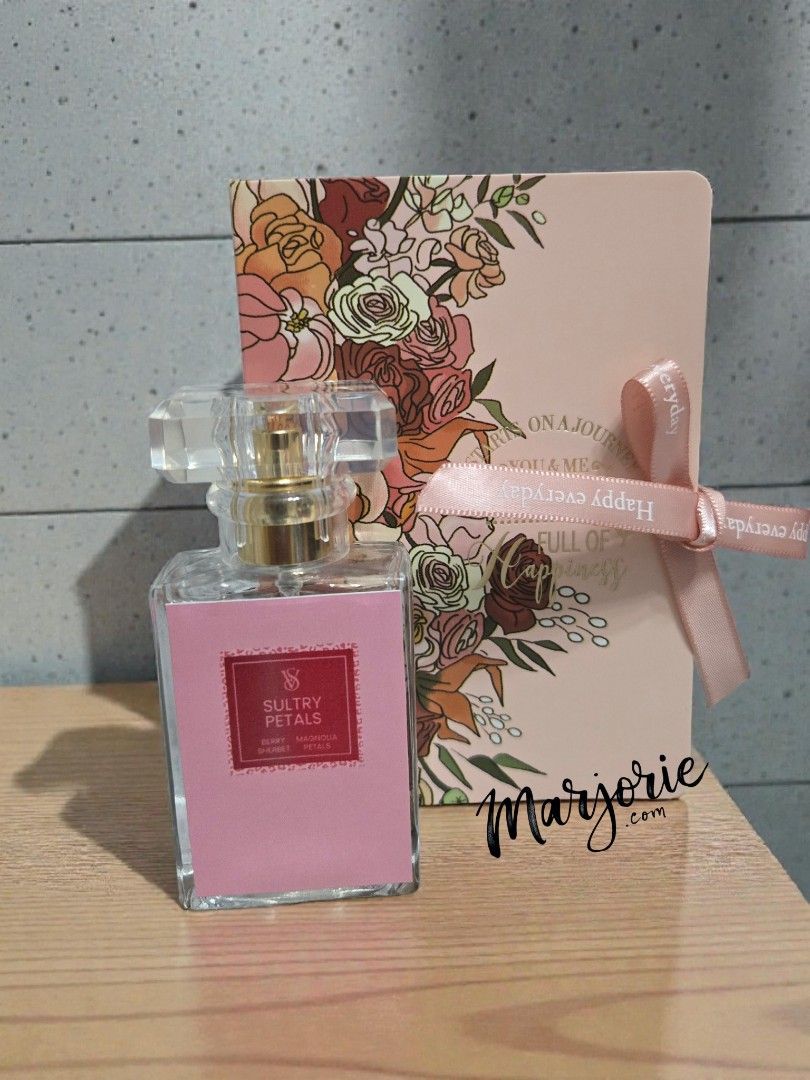 30ml decants Sultry Petals Eau de Parfum (Category: Fragrance & Deodorants) located in Taytay. Submitted by smiggleavenue (Listing ID 1409489798, Image 1). Description: - Sultry Petals Eau de Parfum - Includes gift card and pink ribbon - Clear, rectangular bottle - Gold-colored cap - Pink label with brand name.