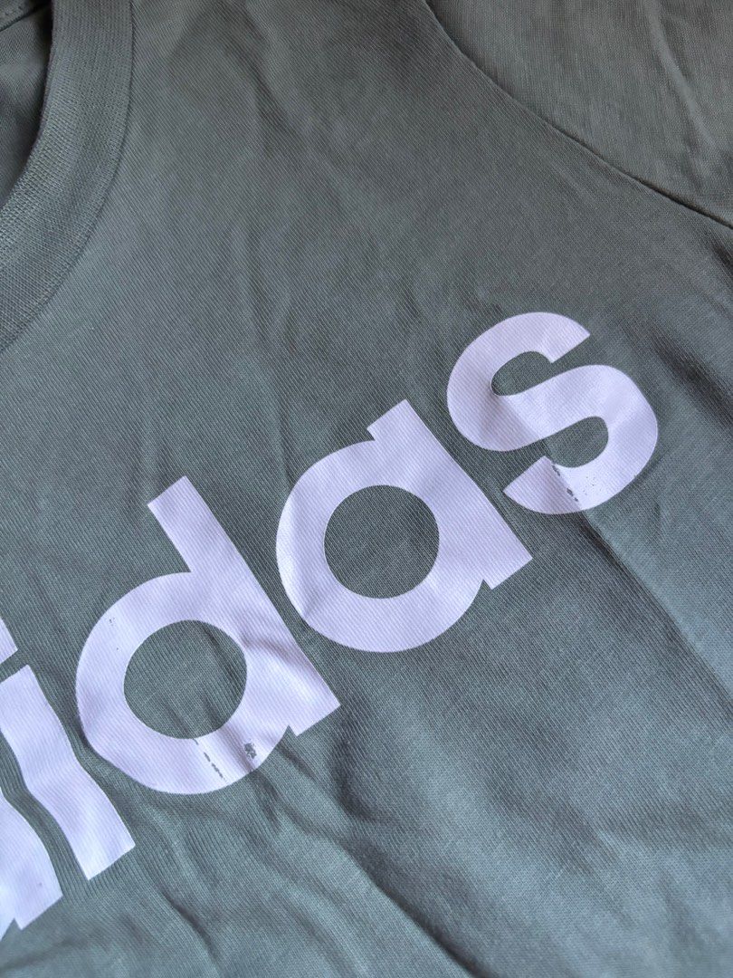 Adidas Olive Green T-shirt (Category: Shirts) located in Manila. Submitted by eloria (Listing ID 1409539089, Image 3). Description: Green Adidas shirt - once used but has been sitting on my cabinet for a year so check last pic for the issue hehe.