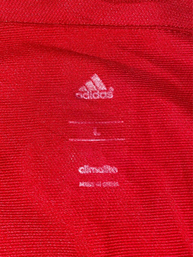 Adidas Spain National Team Jersey (Category: Activewear) located in Naga. Submitted by yspdl10 (Listing ID 1409457526, Image 3). Description: MINT CONDITION - Adidas Spain National Team jersey - Size: L - Color: Red with gold accents - Design: Polo collar, short sleeves - Features: Spain national team crest, Adidas logo - Technology: ClimaLite tag.