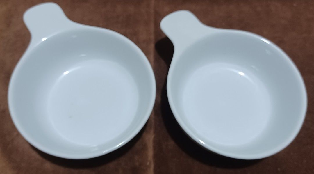 Bake & Serve 2-Piece Ovenware Set (Category: Bakeware) located in Quezon City. Submitted by wjmae (Listing ID 1409539693, Image 1). Description: 2-piece ovenware set from Bake & Serve. The set includes two white handled bake and serve dishes. They are microwave and dishwasher safe, and made of hand-crafted ceramic. Each dish measures approximately 6 inches in diameter. The box is included..