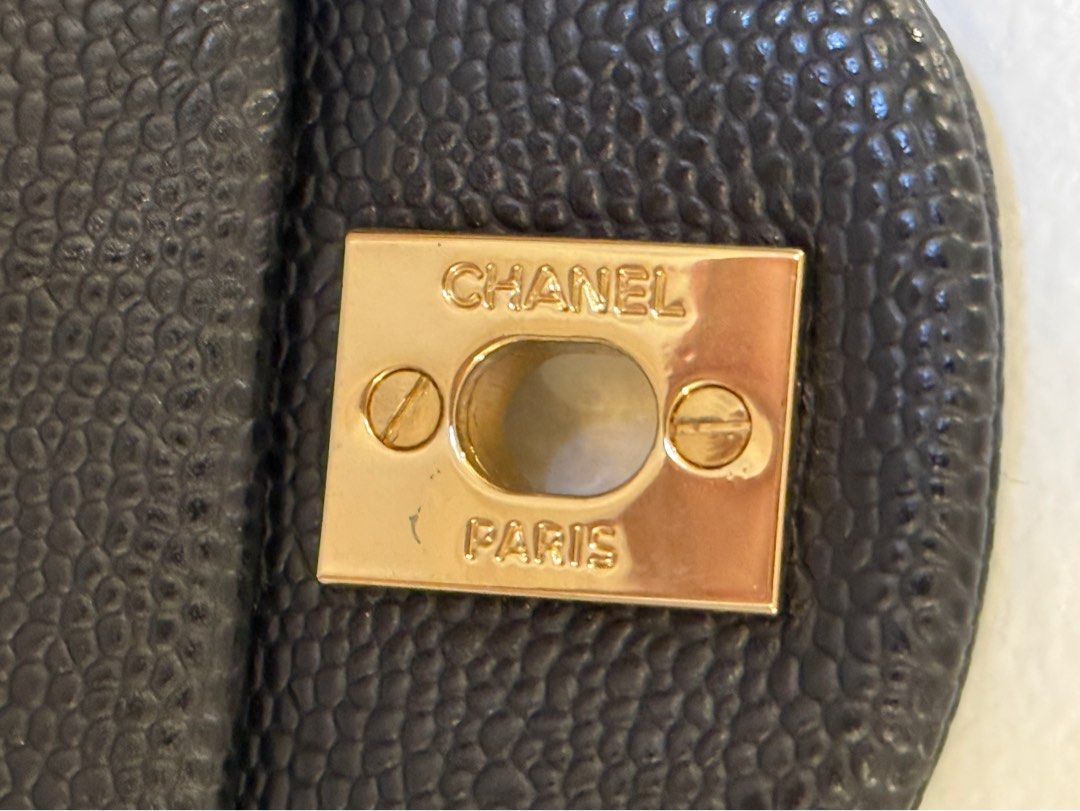 Chanel Classic Flap Bag Black Caviar Leather (Category: Luxury Bags & Wallets) located in Legazpi City. Submitted by shopwithstyleeee (Listing ID 1409557577, Image 3). Description: Chanel Classic Flap Bag in black caviar leather. Features the iconic CC turn-lock closure and a chain strap. The interior lining is a deep red color with the Chanel logo and "Made in France" embossed. The bag has a quilted design and gold-tone hardware..