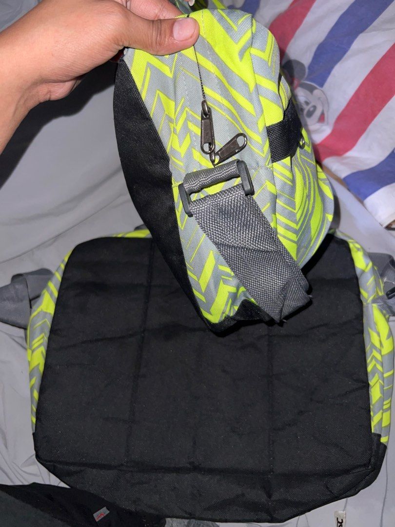 Chevron Pattern Messenger Bag (Category: Luxury Bags & Wallets) located in Manila. Submitted by moon_2026 (Listing ID 1409591994, Image 3). Description: - Chevron patterned messenger bag (gray & neon yellow) - Black base - Adjustable gray shoulder strap - Main compartment - Zippered pocket - Gray interior - Perfect for carrying essentials 130 each if kukunin both 220 nalang.