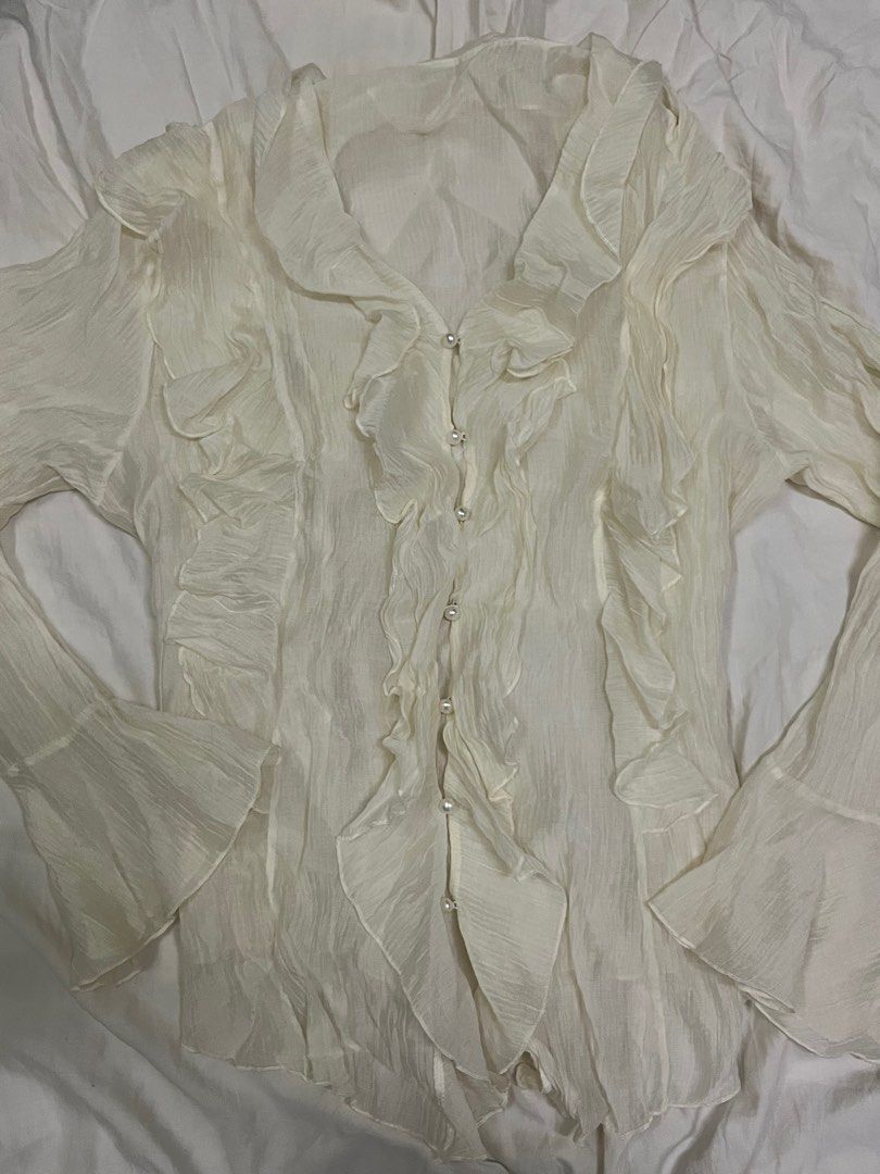 flowy cream top (Category: Longsleeves) located in Angeles City. Submitted by yna.declutter (Listing ID 1409469483, Image 1). Description: 💌 color cream 💌 see through top 💌 very cute top 💌 payment first / gcash.