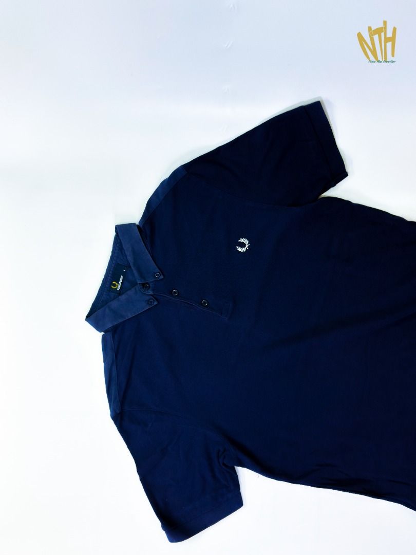 Fred Perry Button Down Polo Shirt in Carbon Blue (Category: Tshirts & Polo Shirts ) located in Caloocan City. Submitted by m3ssy.ph (Listing ID 1409580787, Image 2). Description: Fred Perry Button Down Polo Shirt in Carbon Blue SIZE: L Width: 21" Length (Top to bottom): 29" EXCELLENT CONDITION.