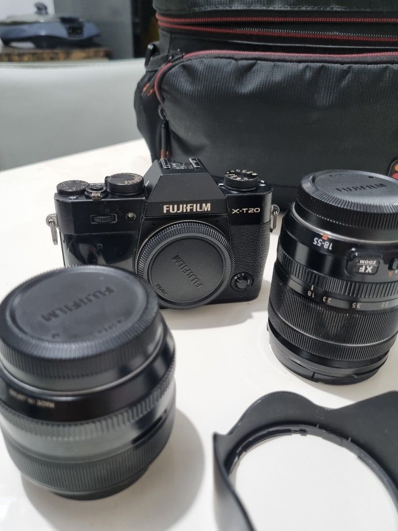 Fujifilm X-T20 + 3 lenses (Category: Cameras) located in Dasmarinas. Submitted by daniellalim_03 (Listing ID 1409435049, Image 1). Description: Fujifilm XT20 Bundle (body +3 lenses) • Body w/ 18mm-55mm kit lens • Fujinon XF 35mm f/1.4 • TTartisan 27mm f/2.8 ~issue: cosmetics (tanggal leather. already ordered replacement). minimal fungus on lenses but it doesn't affect the photo naman. ~shutter count: 29k Selling everything as a bundle for 41,000.