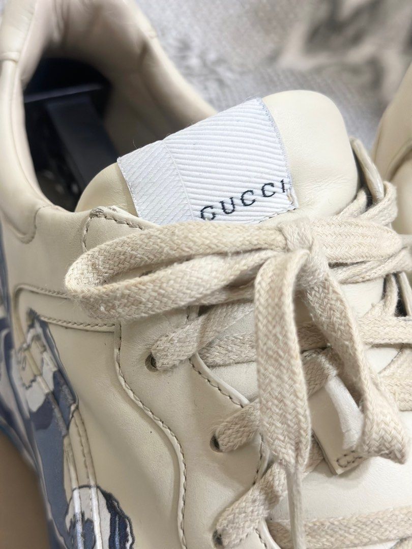 Gucci Rhyton Sneakers (Category: Sneakers & Footwear) located in Quezon City. Submitted by rc_rd (Listing ID 1409467249, Image 1). Description: - Authentic Gucci Rhyton sneakers - Cream-colored leather upper - Unique wave design on the side - Gucci logo on tongue and heel - Includes original box - Includes Gucci card - Chunky sole - Lace-up closure.