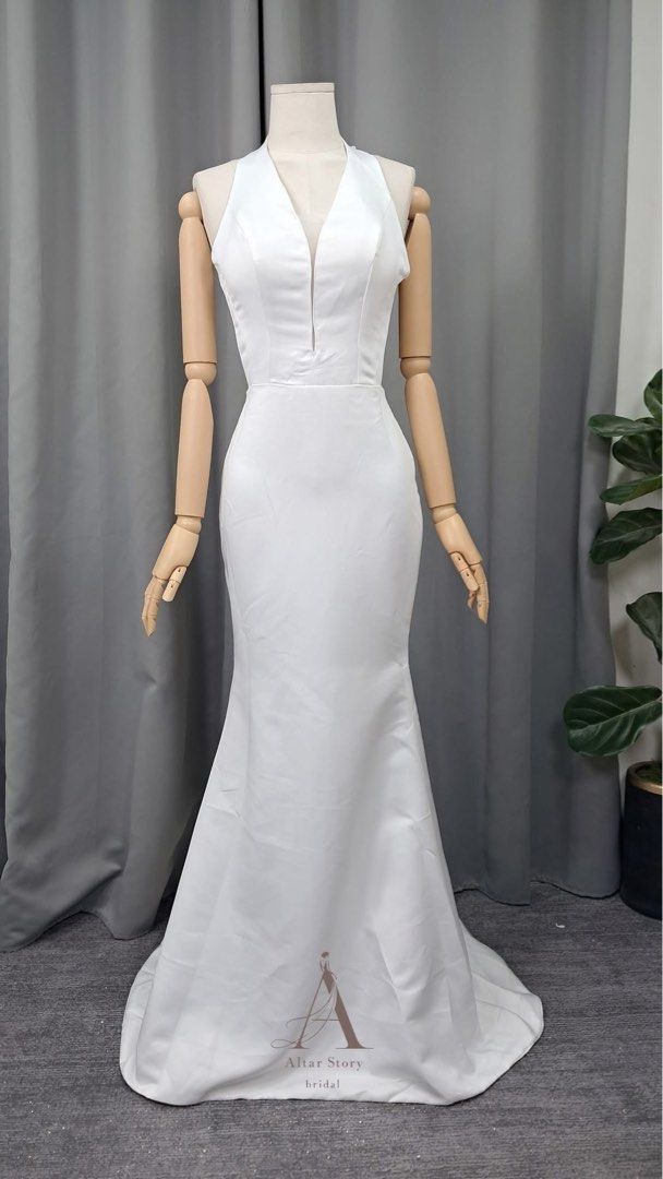 For Rent: Halter Wedding Dress (Category: Evening dresses & gowns) located in Makati City. Submitted by marion.st (Listing ID 1409571259, Image 2). Description: For rent!!!! - Altar Story Bridal wedding dress - Elegant white color - Halter neckline - Flattering mermaid silhouette - Deep V-neckline - Fitted bodice - Flared skirt - Halter back design - Ideal for special occasions - Brand new .