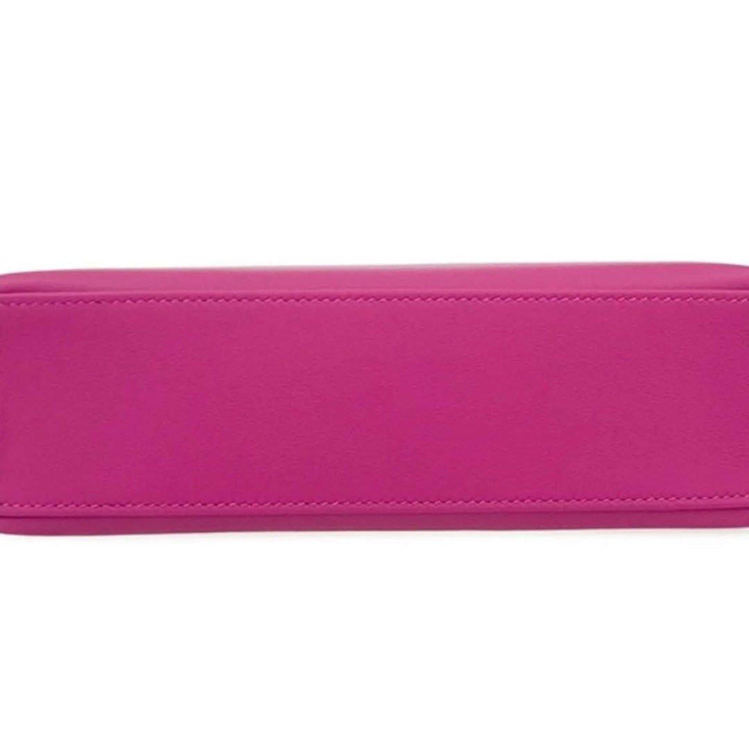 Hermes Mini Pochette Rose Pourpre (Category: Luxury Bags & Wallets) located in Manila. Submitted by mariasells05 (Listing ID 1409520127, Image 3). Description: - Authentic Hermes Mini Pochette - Color: Rose Pourpre - Features top handle and turn-lock closure - Includes full box - C stamp - Vibrant color, clean interior - Stylish and compact.