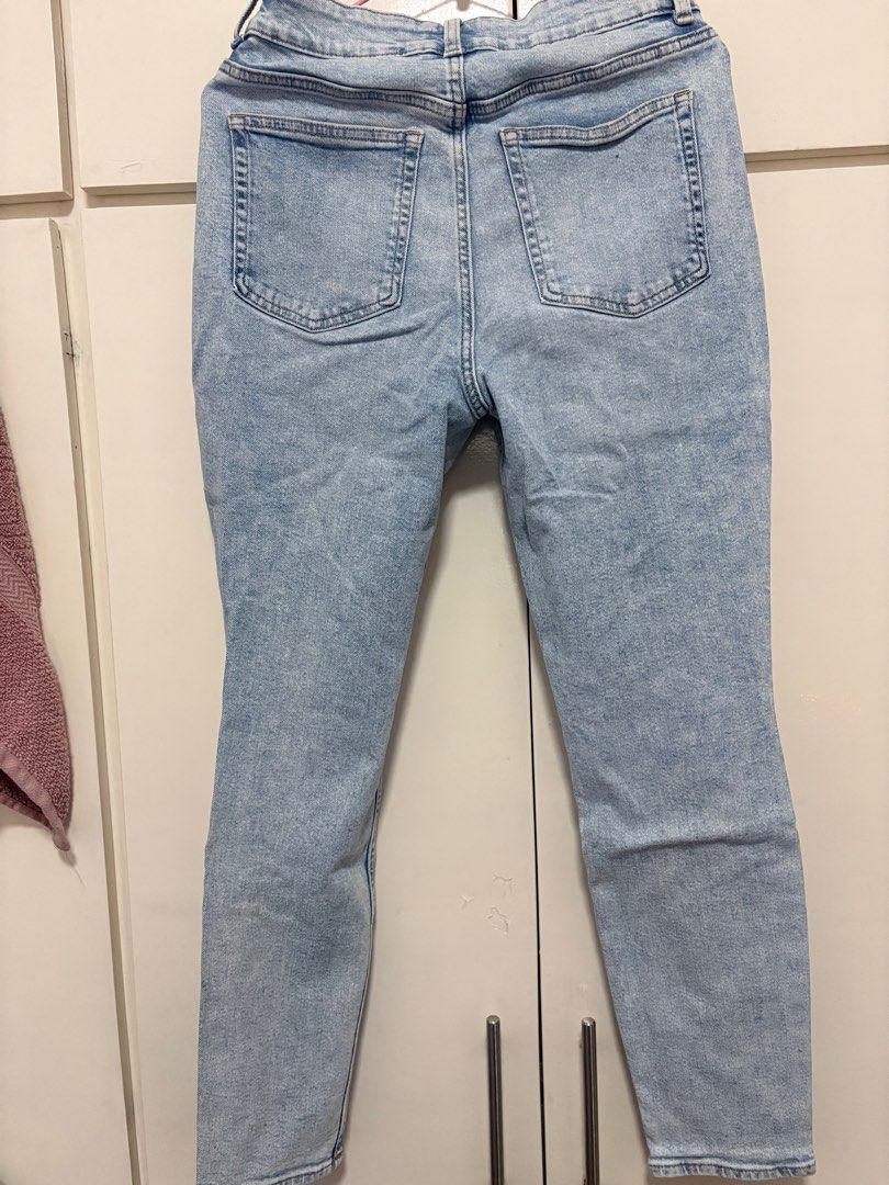 High-Waisted Acid Wash Jeans (Category: Jeans) located in Manila. Submitted by coponeypi (Listing ID 1409468567, Image 2). Description: - High-waisted jeans - Acid wash design - Classic five-pocket style - Button and zipper closure - Slim fit - Light blue color.