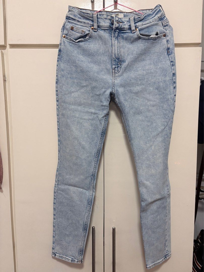 High-Waisted Acid Wash Jeans (Category: Jeans) located in Manila. Submitted by coponeypi (Listing ID 1409468567, Image 1). Description: - High-waisted jeans - Acid wash design - Classic five-pocket style - Button and zipper closure - Slim fit - Light blue color.