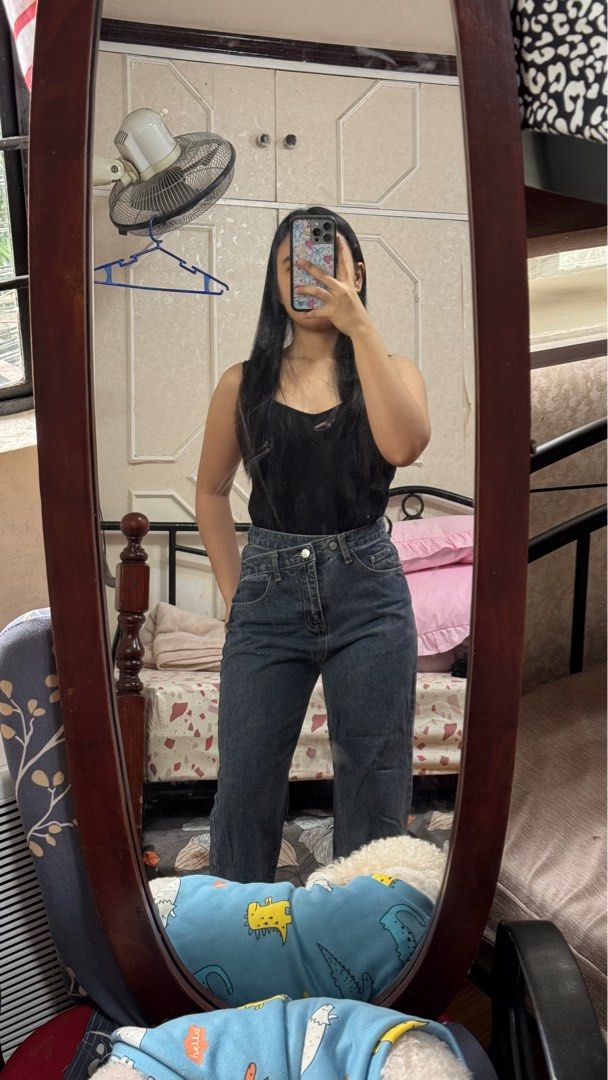 High-Waisted Denim Jeans (Category: Jeans) located in Quezon City. Submitted by declutterrringme (Listing ID 1409499832, Image 1). Description: - High-waisted denim jeans - Straight leg cut - Classic five-pocket design - Button and zipper closure - Versatile for casual outfits.