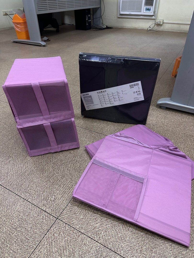 IKEA SKUBB Storage Box (Category: Storage Boxes & Baskets) located in Quezon City. Submitted by thegirlsroom (Listing ID 1409464484, Image 3). Description: - IKEA SKUBB storage boxes - Light purple color - Made of fabric with mesh sides - Features a zipper closure - Includes handles for easy carrying - Stackable design - Perfect for organizing clothes, accessories, and more - Set includes multiple boxes AVAILABLE IN PURPLE AND BLACK 250/ pc .