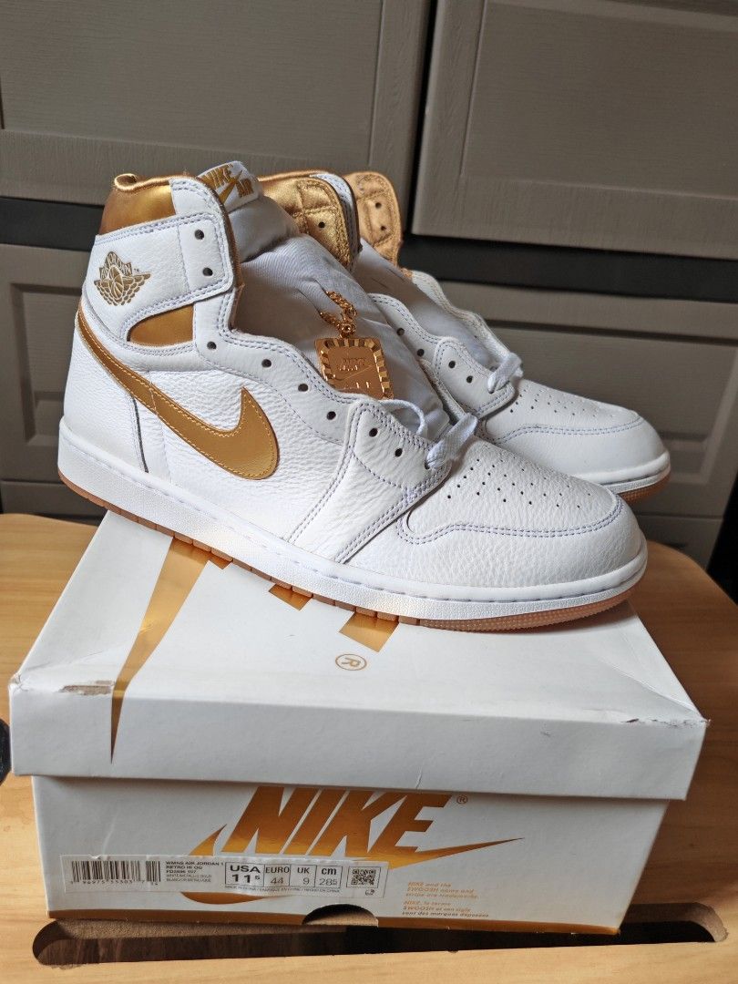 Jordan 1 Metallic Gold and white (Category: Sneakers) located in Cabuyao City. Submitted by jeromecgo (Listing ID 1409496448, Image 2). Description: For sale local pair 100% authentic Jordan 1 Metallic Gold and white US 9.5, womens 11.5 bnew with box meet up: laguna area, if metro manila, meet in my convenience delivery: buyer's expense tag: Nike, Jordan, Adidas, New balance, Li-Ning, Anta, timberland, puma, underarmour.