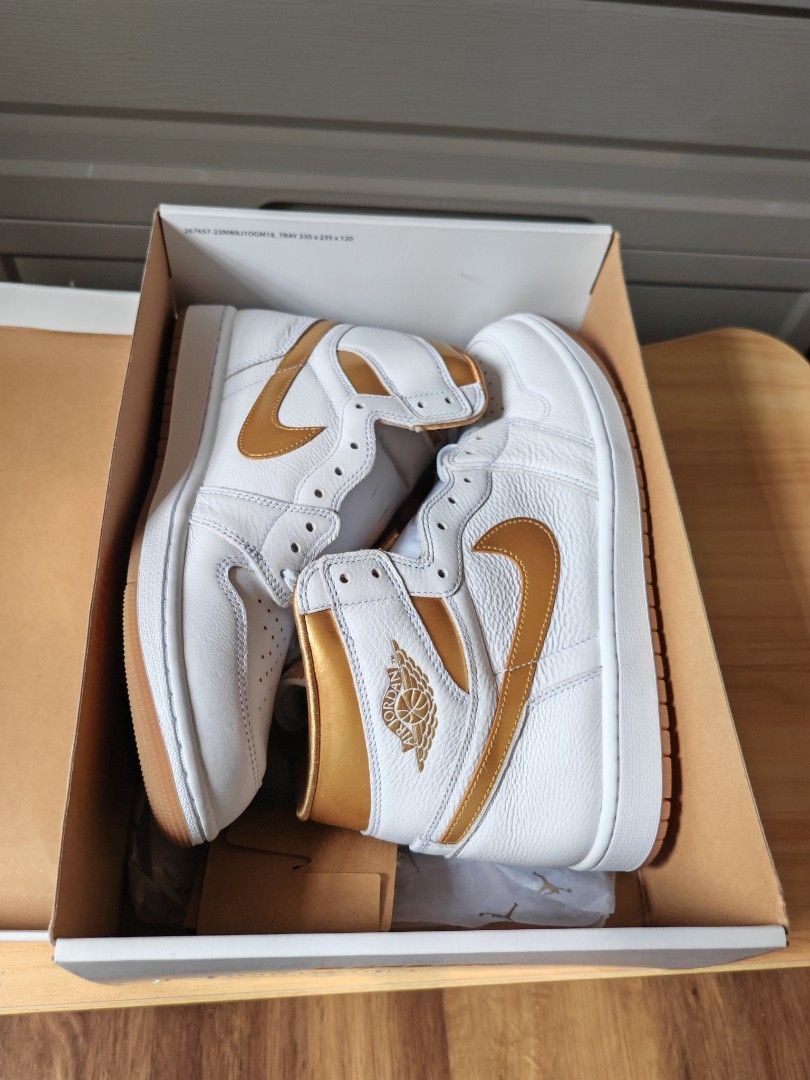 Jordan 1 Metallic Gold and white (Category: Sneakers) located in Cabuyao City. Submitted by jeromecgo (Listing ID 1409496448, Image 3). Description: For sale local pair 100% authentic Jordan 1 Metallic Gold and white US 9.5, womens 11.5 bnew with box meet up: laguna area, if metro manila, meet in my convenience delivery: buyer's expense tag: Nike, Jordan, Adidas, New balance, Li-Ning, Anta, timberland, puma, underarmour.