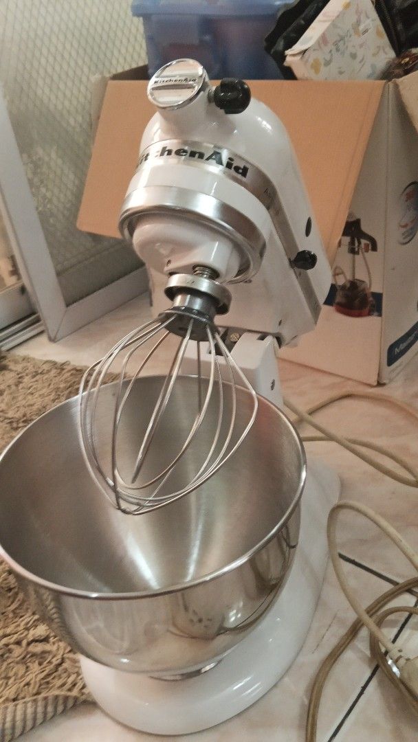 KitchenAid Stand Mixer (Category: Hand & Stand Mixers) located in Manila. Submitted by coolbear-0f92e9 (Listing ID 1409489591, Image 1). Description: - KitchenAid stand mixer - White color - Stainless steel bowl - Includes whisk attachment - In good working condition - Ideal for baking enthusiasts - A great kitchen addition.