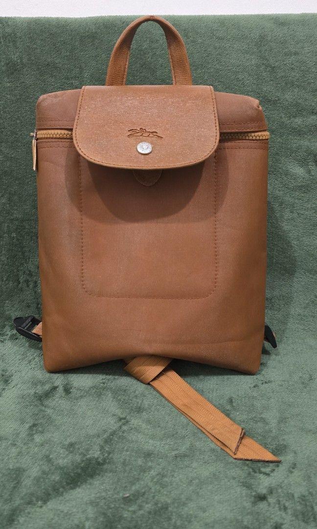 Longchamp Cognac Backpack (Category: Luxury Bags & Wallets) located in Bacoor. Submitted by deux_trading_corporation (Listing ID 1409610860, Image 1). Description: Message for more pics. Negotiable. With COD but with down payment for assurance. Can do LBC COP with ¼ down payment on the value of items..