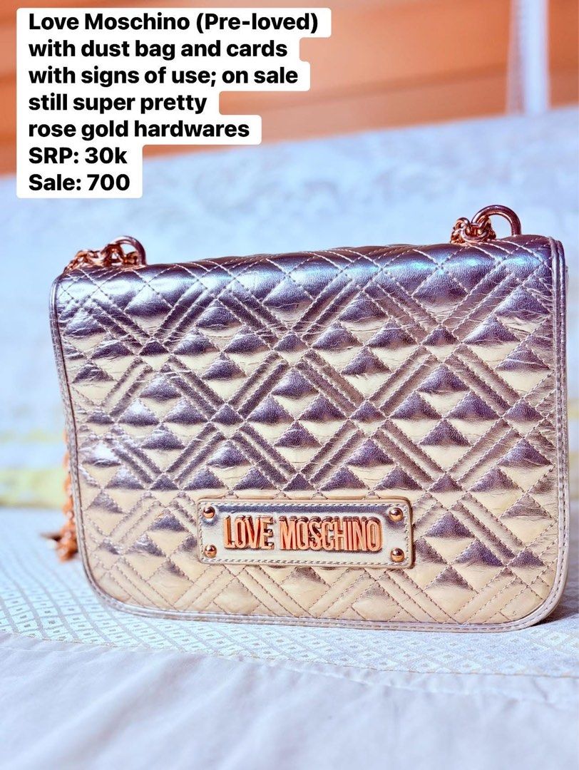 Love Moschino Rose Gold Bag (Category: Luxury Bags & Wallets) located in Quezon City. Submitted by pinky600 (Listing ID 1409448617, Image 1). Description: - Pre-loved Love Moschino handbag - Rose gold hardware - Quilted design - Chain strap - Includes dust bag and cards - Selling for ₱700 (SRP: ₱30,000).