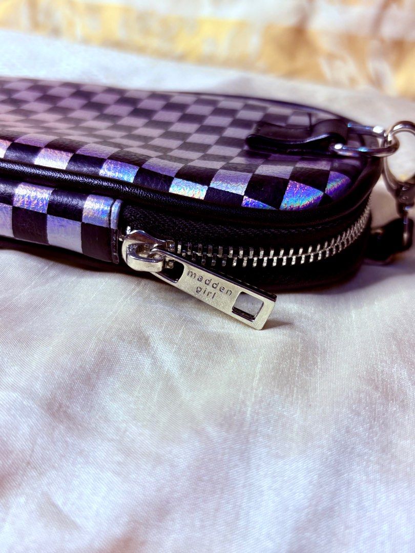 Madden Girl Checkerboard Bag (Category: Luxury Bags & Wallets) located in Quezon City. Submitted by pinky600 (Listing ID 1409450436, Image 2). Description: - Pre-loved Madden Girl bag - Unique checkerboard pattern - Zippered closure - Small strap - Black interior - "Madden Girl" zipper detail.