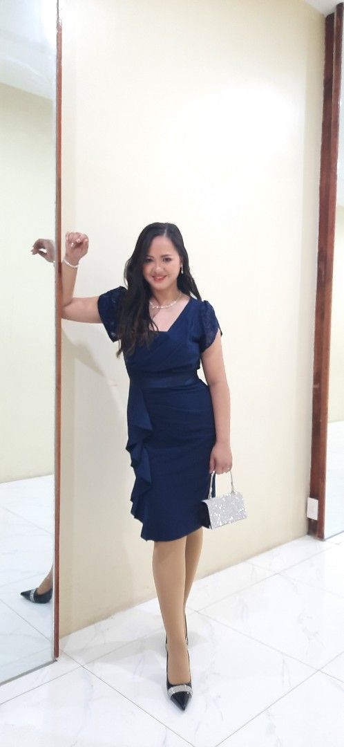 Navy Blue Cocktail Dress (Category: Dresses) located in Subic. Submitted by amazingchoice (Listing ID 1409514855, Image 3). Description: Navy blue cocktail dress - V-neckline with sequin detailing - Fitted waist - Ruffle detail on skirt - Knee-length hemline - Perfect for special occasions - in good condition - no issue - used once only.