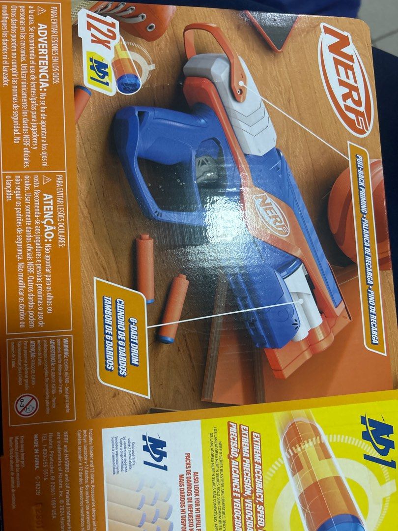 Selling Low: Nerf N-Strike Elite Series Agility (Category: Action & Battle Toys) located in Manila. Submitted by goodluckstuff (Listing ID 1409436507, Image 3). Description: - Nerf N-Strike Elite Agility toy gun - 6-dart revolving drum - Includes 12 darts - Recommended for ages 8+ - Color scheme: Blue, orange, and white - Features pull-back priming - Box indicates extreme accuracy, speed, and precision * Selling very low. Item must go. * Special 