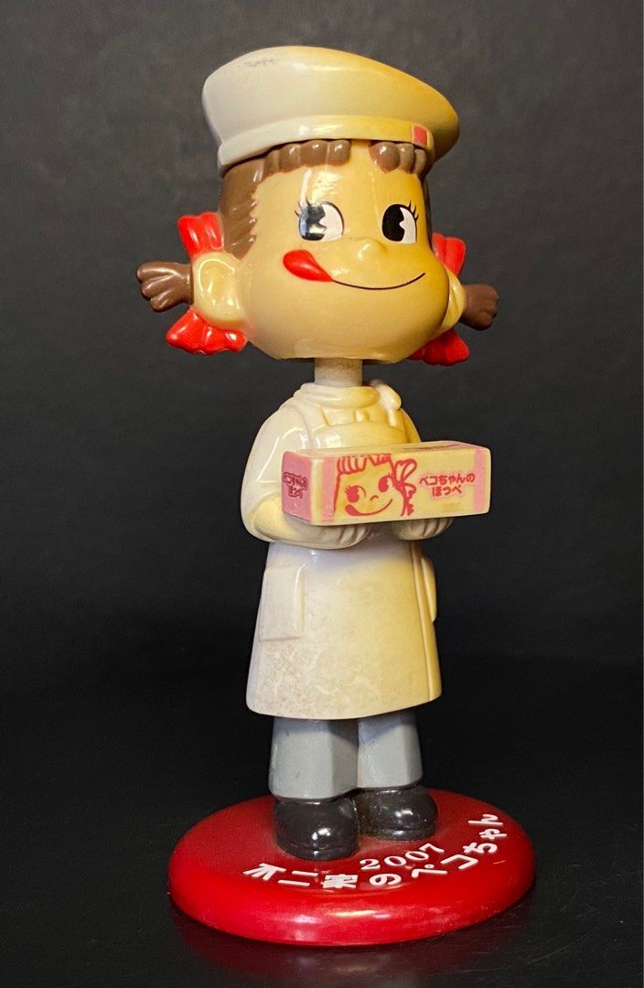 Peko and Poko chan and Chef Figure set (Category: Figurines & Statues) located in Agoo. Submitted by collect12 (Listing ID 1409549522, Image 2). Description: - Peko and Poko chan chef figure set - Includes two figurines: Peko-chan chef and male chef - Both figurines are on red bases - Peko-chan figurine has a 2001 marking - Collectible item.