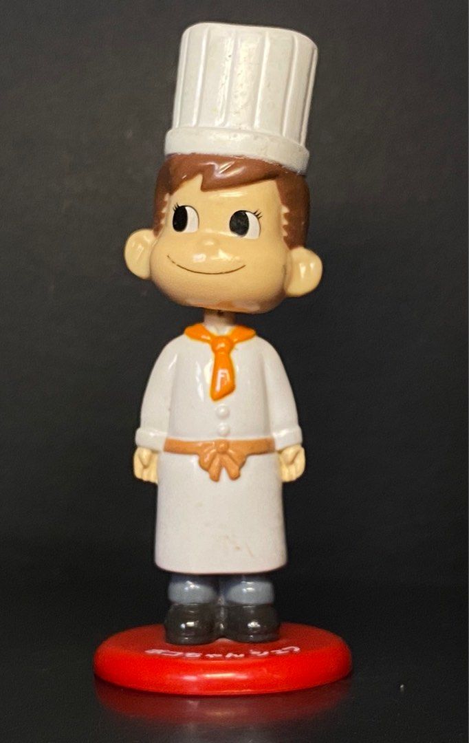 Peko and Poko chan and Chef Figure set (Category: Figurines & Statues) located in Agoo. Submitted by collect12 (Listing ID 1409549522, Image 3). Description: - Peko and Poko chan chef figure set - Includes two figurines: Peko-chan chef and male chef - Both figurines are on red bases - Peko-chan figurine has a 2001 marking - Collectible item.