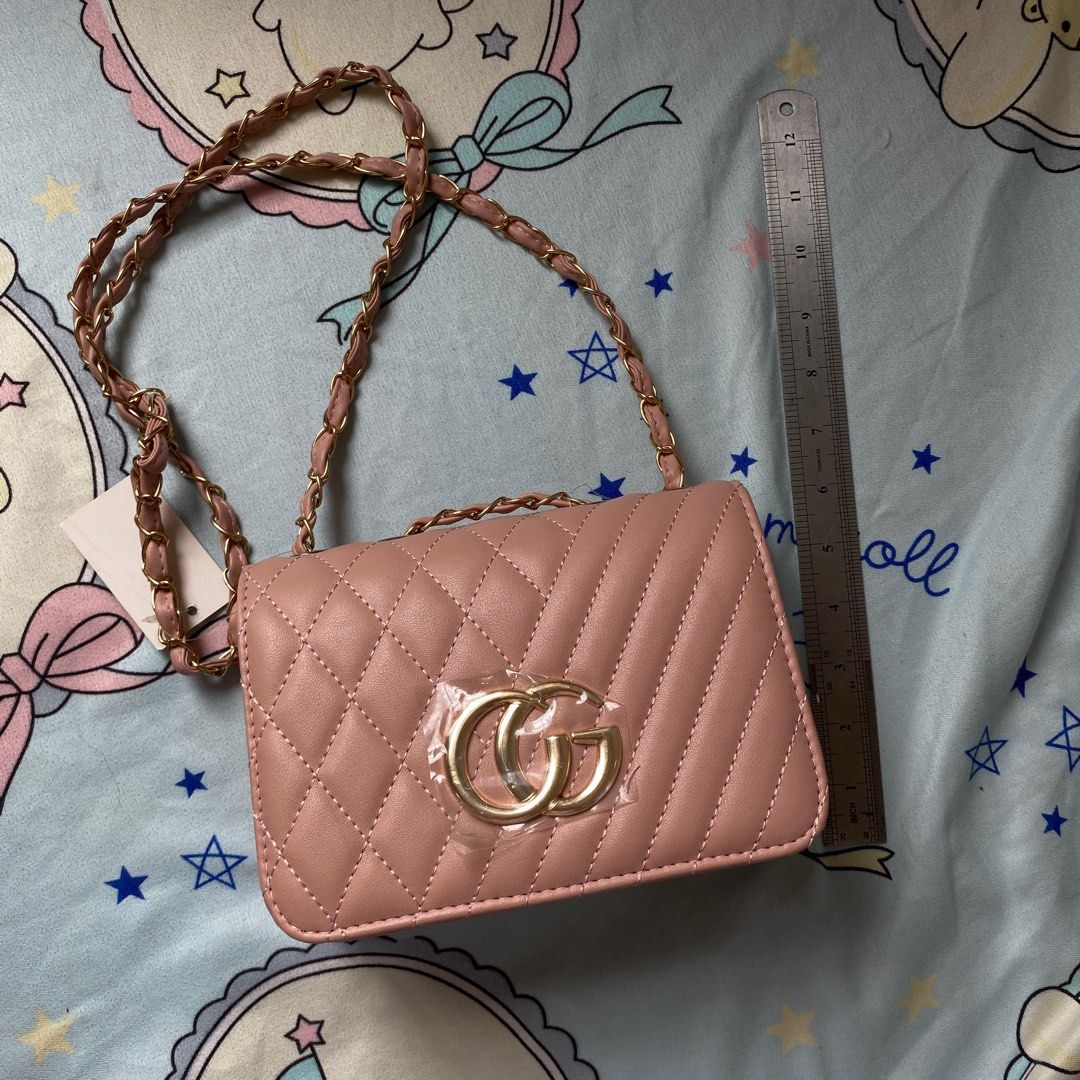 Pink Quilted Shoulder Bag with Gold Chain (Category: Shoulder Bags) located in Taguig. Submitted by anndefined (Listing ID 1409470643, Image 1). Description: - never used.