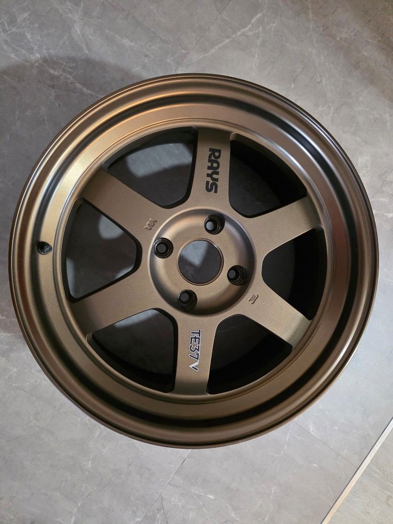Rays TE37V (Category: New Rims) located in Singapore. Submitted by carcultures (Listing ID 1409566255, Image 1). Description: has abit of tyre removal marks on the edge of the rim. one wheel has a stone chip from driving. specs are 114.3 x 4 17 x 8 +25.
